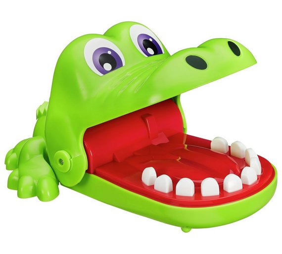 Crocodile Dentist by Hasbro - green plastic crocodile toy with mouth open showing his teeth